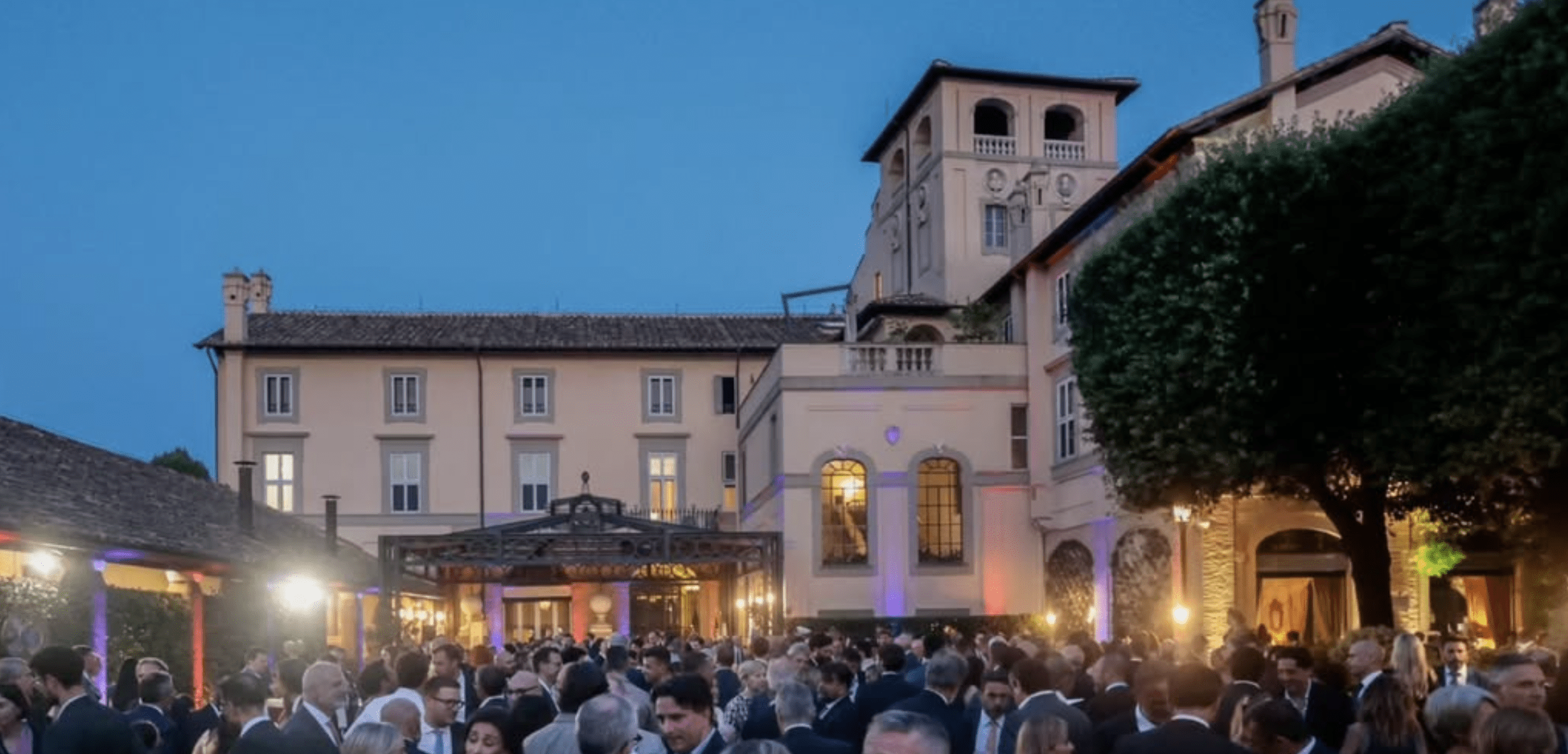 Guests gather in the garden of Villa Taverna in Rome for the US Independence Day reception